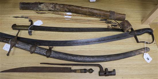 A Scimitar, a 1796 pattern sabre, bayonets, etc